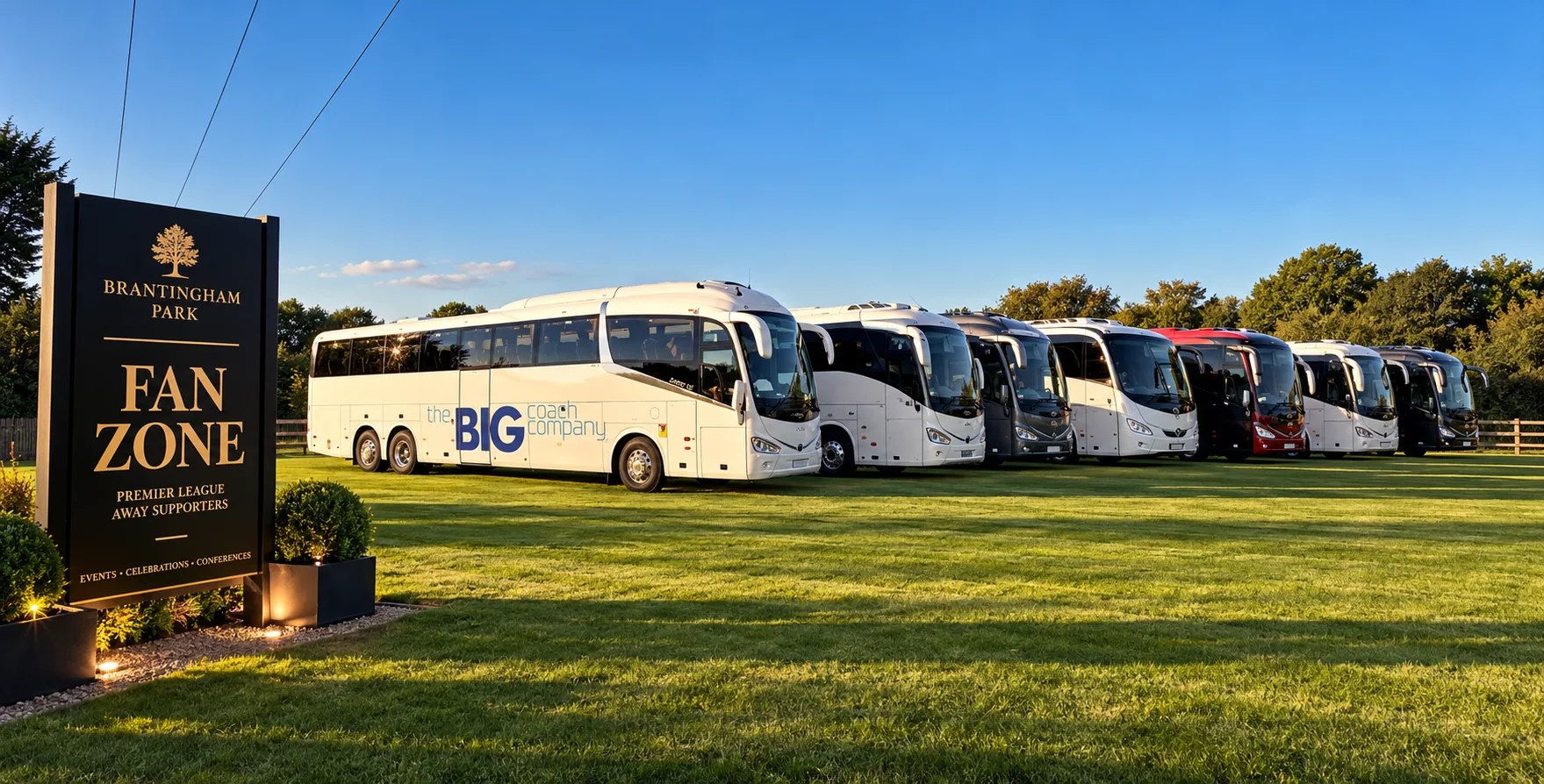 Seven away-supporter coaches parked at Brantingham Park Fan Zone near Hull